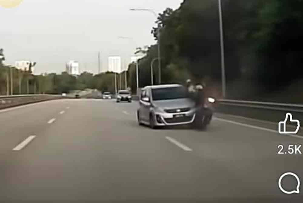 Screenshot of a viral video showing a car colliding with a motorcycle on Lebuh Nusajaya.