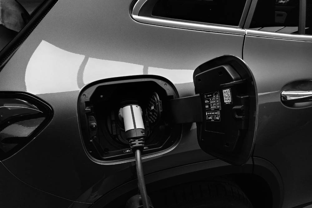 Despite rising EV sales in Malaysia, the numbers still fall short of the government's 15 per cent adoption target by 2030. Photo: Edited via Canva