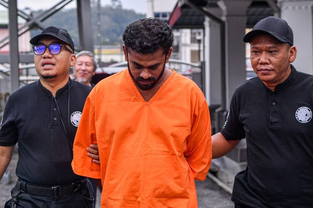 The e-hailing driver was charged with killing the boy between 9.02 am and 12.55 pm on July 23, under Section 302 of the Penal Code, which carries the death penalty or a maximum of 40 years imprisonment and 12 strokes of the cane, if convicted. Photo by Bernama