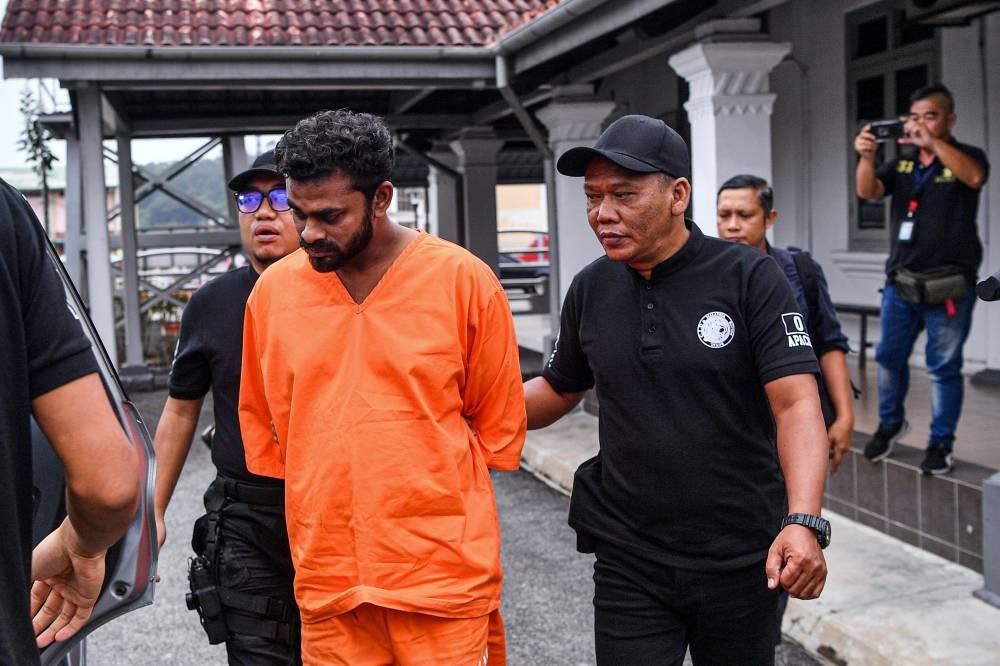 The e-hailing driver was charged with killing the boy between 9.02 am and 12.55 pm on July 23, under Section 302 of the Penal Code, which carries the death penalty or a maximum of 40 years imprisonment and 12 strokes of the cane, if convicted. Photo by Bernama