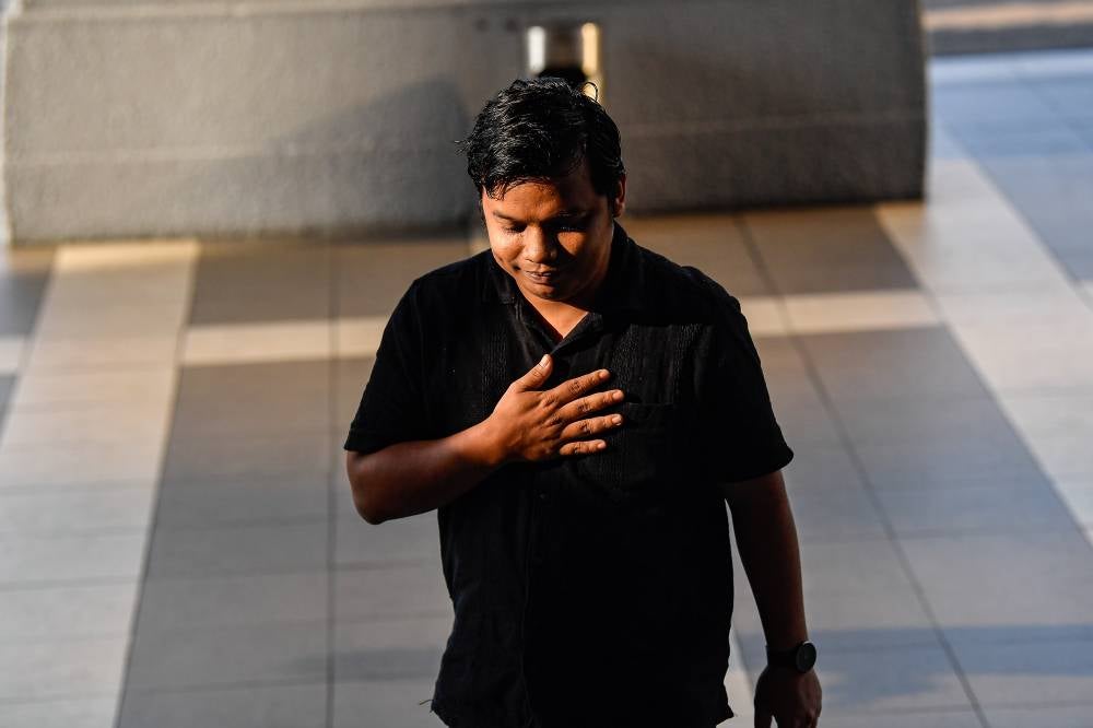 The Magistrate's Court today acquitted and discharged former Malaysian Muda Amir Hariri Abd Hadi on a charge of failing to duly inform the police police before holding a protest gathering on the LCS issue in August 2022. - Photo by Bernama