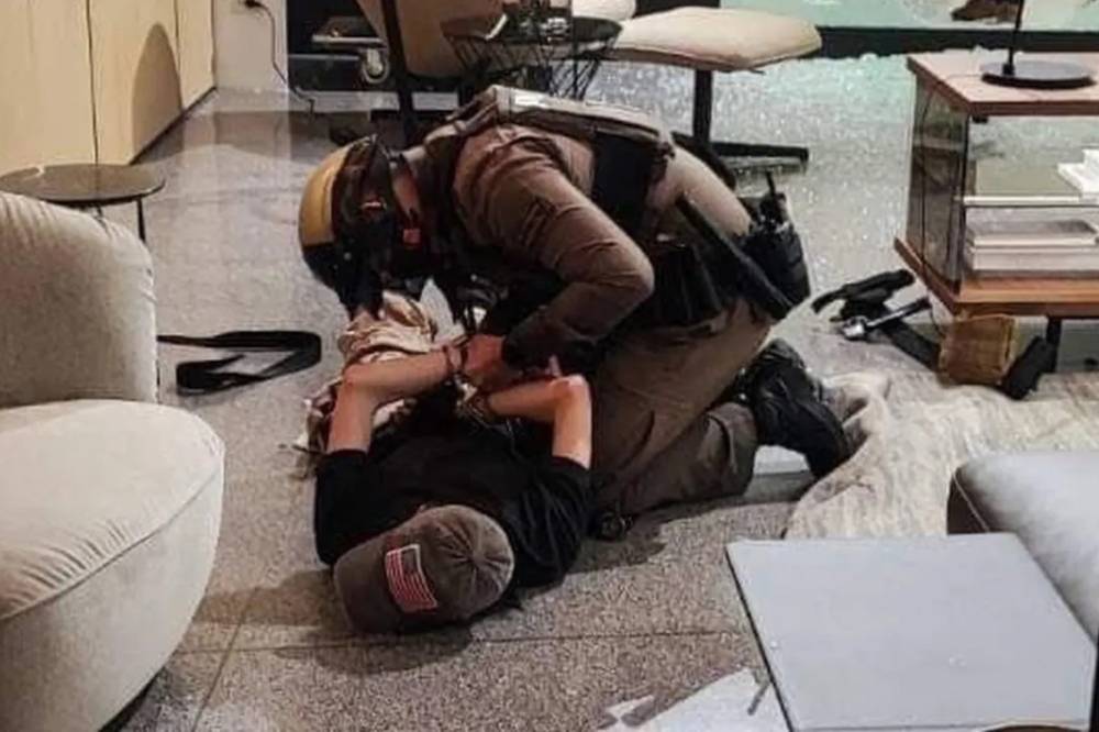 The suspect was apprehended by police after surrendering. Photo: X