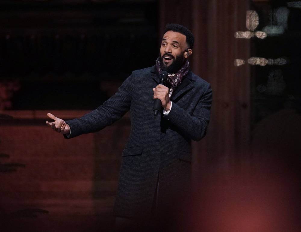 Singer Craig David performs the song 'Have Yourself a Merry Little Christmas' during the 'Royal Carols: Together At Christmas', at Westminster Abbey in London on Dec 15, 2022. - (Photo by Yui Mok / AFP)