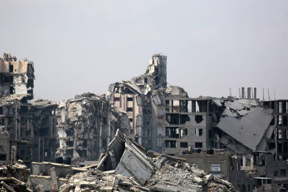 War-damaged buildings stand in Gaza City on Aug 8, 2025. - (Photo by BASHAR TALEB / AFP)