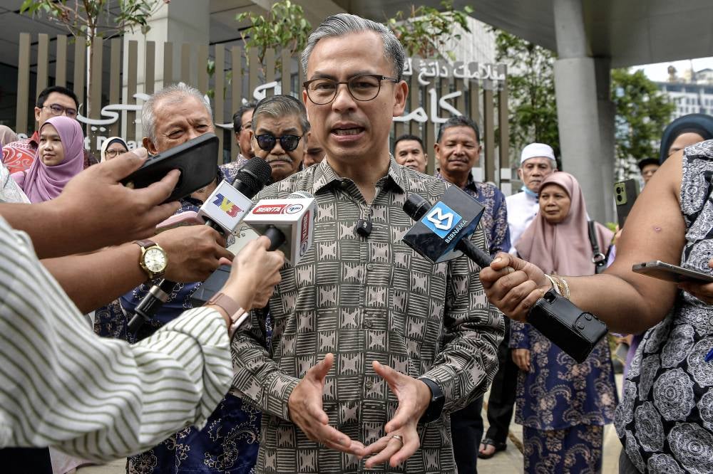 Communications Minister Datuk Fahmi Fadzil. Photo by Bernama