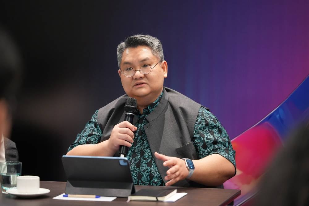 Dr Piti Srisangnam, Executive Director of the ASEAN Foundation, sharing how AI Ready ASEAN brings together regional stakeholders to champion AI safety and promote ethical, responsible adoption.