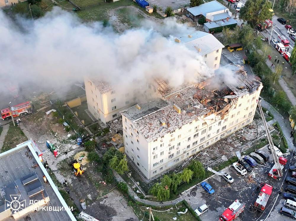 This handout photograph taken and released by the Ukrainian Emergency Service on August 18, 2025, shows a damaged residential building following an air attack, in Kharkiv, amid the Russian invasion of Ukraine. Photo by Handout/Ukrainian Emergency Service/AFP