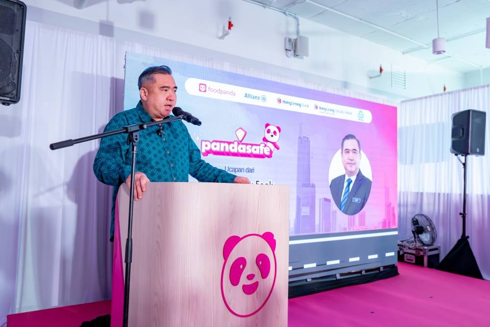 YB Anthony Loke, Minister of Transport delivers his speech during the launch of the pandasafe programme. - Photo: FOODPANDA