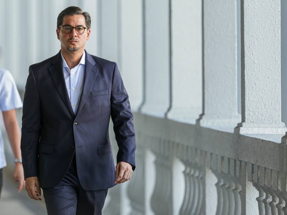 The Sessions Court here today acquitted and discharged Segambut Bersatu deputy chief Adam Radlan Adam Muhammad of all 12 corruption and money laundering charges related to the Jana Wibawa project made against him after paying a compound of RM4.1 million. - Photo by Bernama