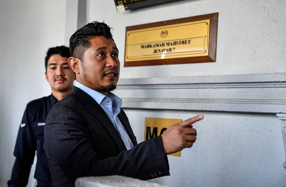 Gombak Setia assemblyman Muhammad Hilman Idham was charged at the Magistrate’s Court today with making a statement on the social media platform TikTok late last month that allegedly caused public fear. - Photo by Bernama