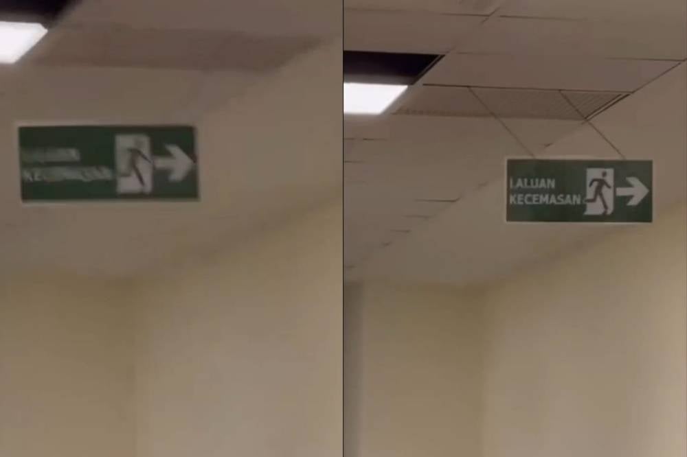 A viral TikTok video showing a swaying emergency exit sign at Complex C, Putrajaya, has sparked claims of supernatural activity linked to recently felled trees said to house spirits. Photo: Screenshot from TikTok