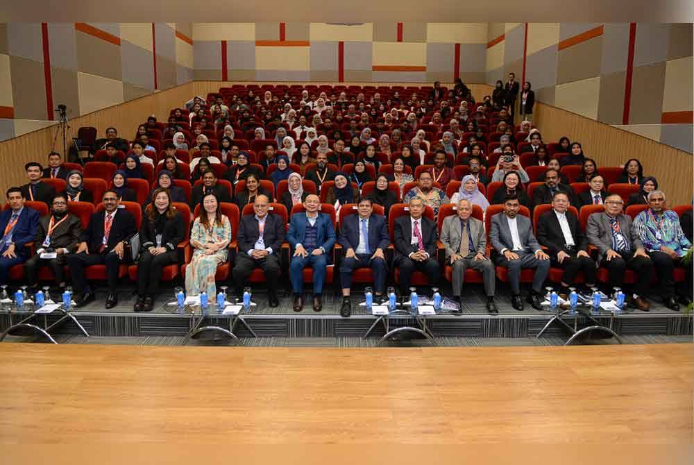 Nasir (front row, fifth from right) with fellow speakers and participants of the International Conference on Accounting & Business (Mi-CAB 2025) at MAHSA University on Friday.