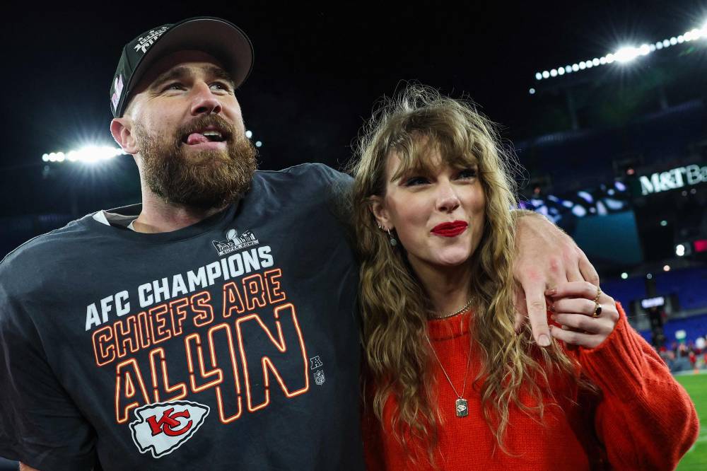 Travis Kelce #87 of the Kansas City Chiefs (L) celebrates with Taylor Swift after defeating the Baltimore Ravens in the AFC Championship Game at M&T Bank Stadium on Jan 28, 2024 in Baltimore, Maryland. - (Photo by Patrick Smith / GETTY IMAGES NORTH AMERICA / AFP)