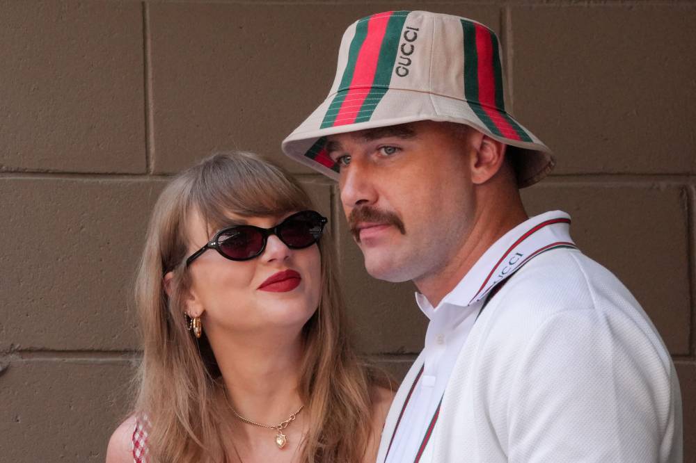 US singer-songwriter Taylor Swift (L) and boyfriend US NFL football player Travis Kelce attend the men's final match between USA's Taylor Fritz and Italy's Jannik Sinner on day fourteen of the US Open tennis tournament at the USTA Billie Jean King National Tennis Center in New York City, on Sept 8, 2024. - (Photo by TIMOTHY A. CLARY / AFP)
