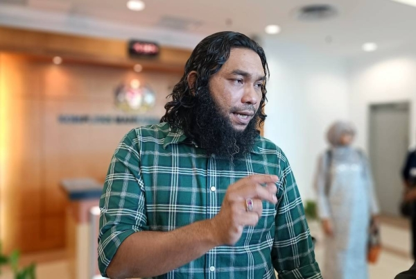 Former Umno Youth Exco Wan Muhammad Azri Wan Deris, better known as Papagomo, was sentenced to 30 days in jail for contempt of court. FILE PIX