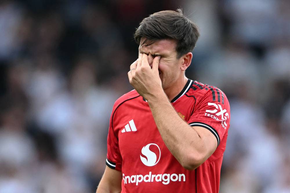 Manchester United's English defender Harry Maguire reacts following the English Premier League football match between Fulham and Manchester United at Craven Cottage in London on August 24, 2025. (Photo by JUSTIN TALLIS / AFP) 