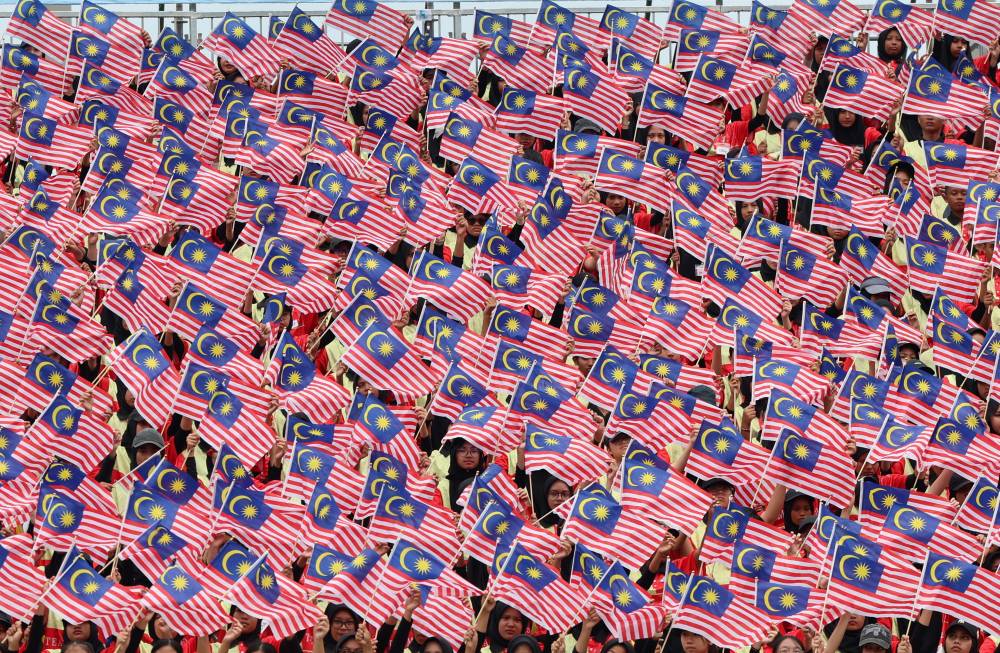 Merdeka is often celebrated with pride and joy, but Malaysians believe its meaning goes deeper than a single day. - Photo by Bernama