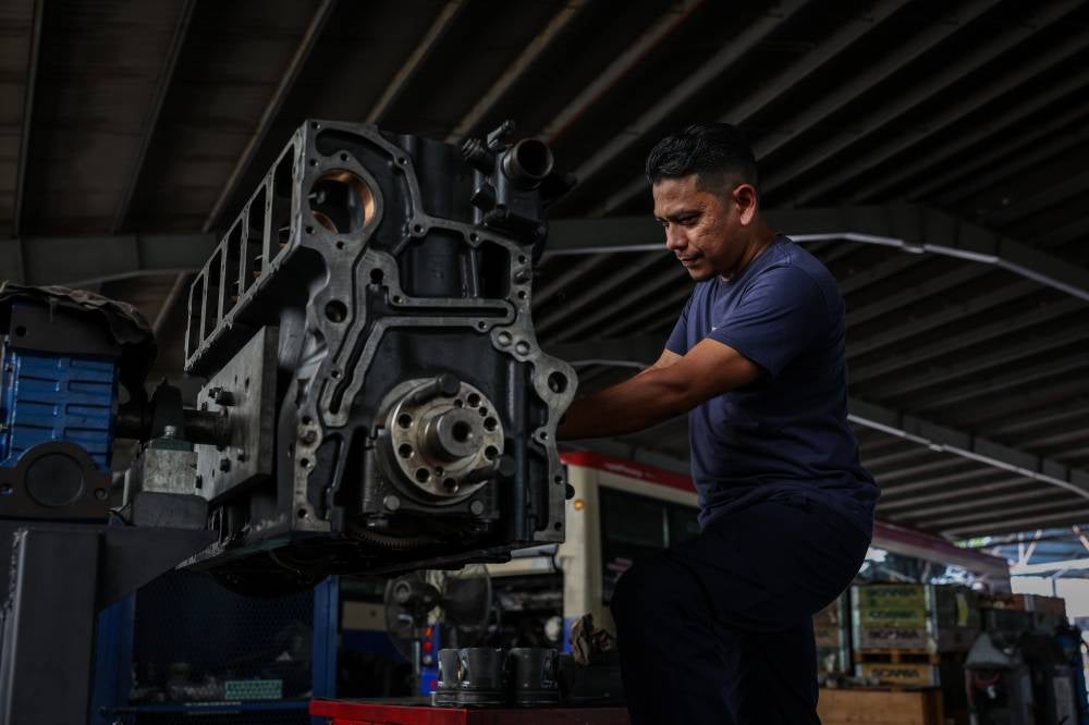 Experienced senior technician and expert in bus wiring systems, Mohamad Afnan Mohd Shatir seen during an interview with Bernama at the Rapid Penang workshop in Lorong Kulit. - Bernama photo