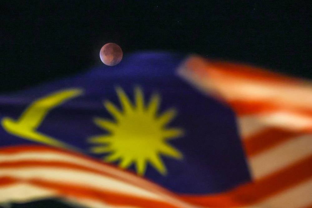 National Planetarium director Mohd Zamri Shah Mastor explained that the moon changes colour because the Earth blocks direct sunlight from reaching it. - Bernama photo