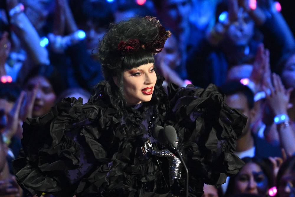 US singer-songwriter Lady Gaga accepts the Artist of the Year award on stage during the MTV Video Music Awards at UBS Arena in Elmont, New York, on September 7, 2025. (Photo by ANGELA WEISS / AFP)