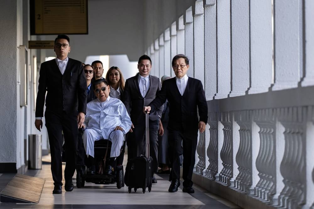 Highway construction company director Tan Sri Abu Sahid Mohamed was charged at the Sessions Court today with four counts of criminal breach of trust involving more than RM313 million and 13 counts of money laundering involving RM139.2 million. Photo by Bernama