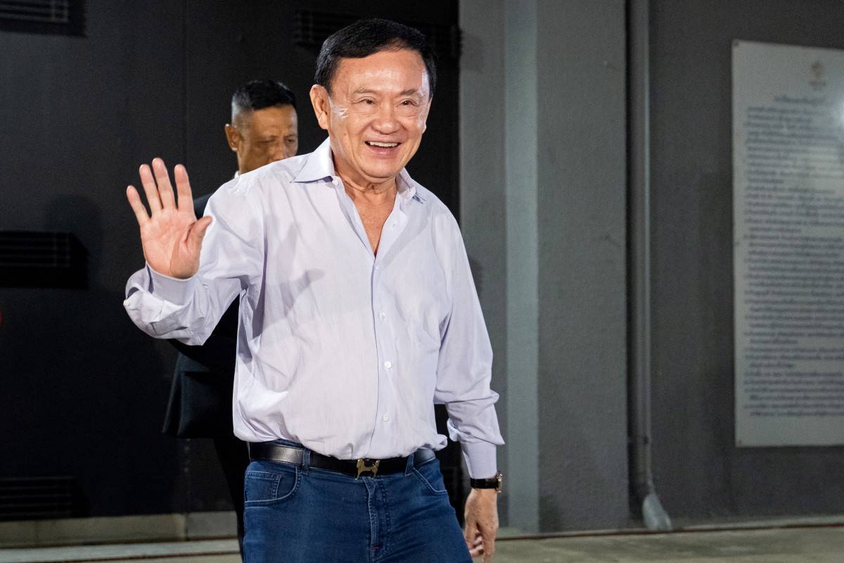 Thailand's former Prime Minister Thaksin Shinawatra leaves the Pheu Thai Party headquarters in Bangkok on August 29, 2025. (Photo by Chanakarn LAOSARAKHAM / AFP)