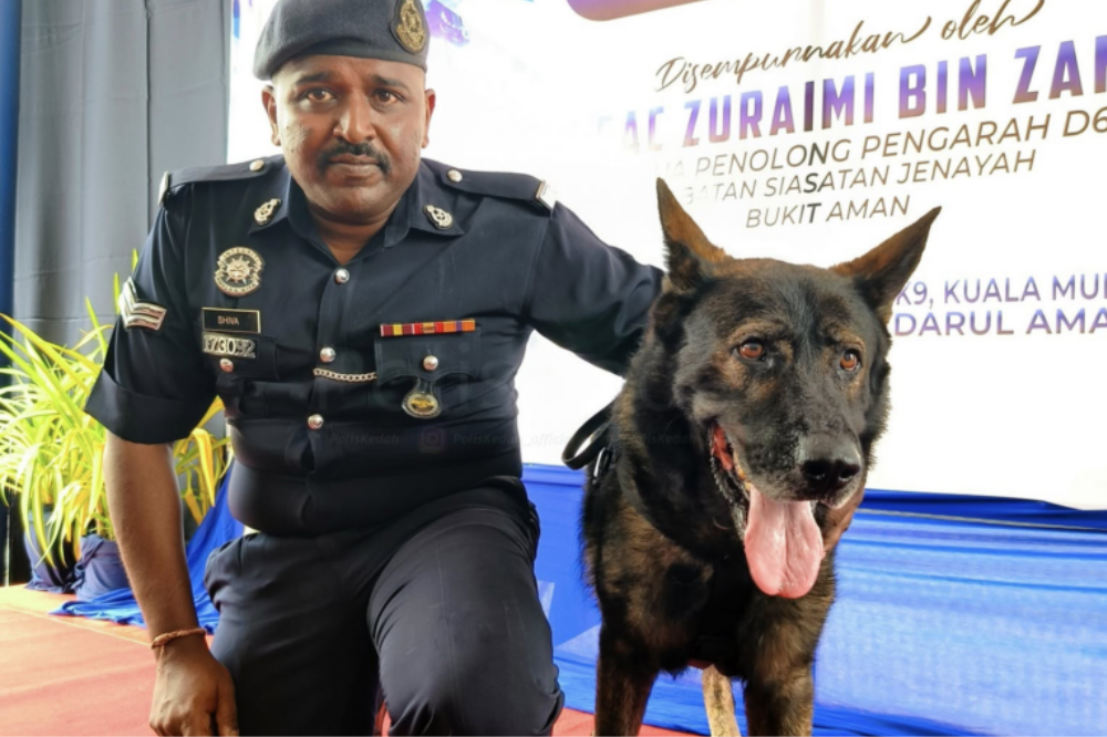 Goran’s original handler Corporal M. Shivabalan - Photo: Polis Kedah Polis Diraja Malaysia / Facebook