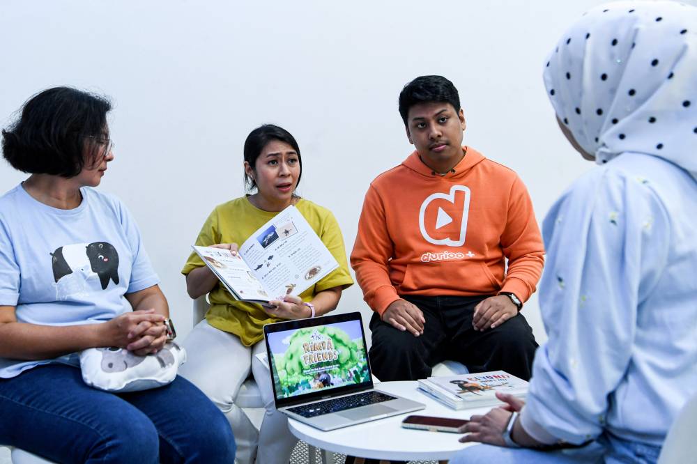 Authors of Anak Rimba Books and Producers of Anak Rimba Animations, Abyan Junus-Nishizawa (middle) and Farah Landemaine (left) during an interview session with Bernama in conjunction with the special screening of The Rimba and Friends, the animated adaptation of their books. - Bernama photo