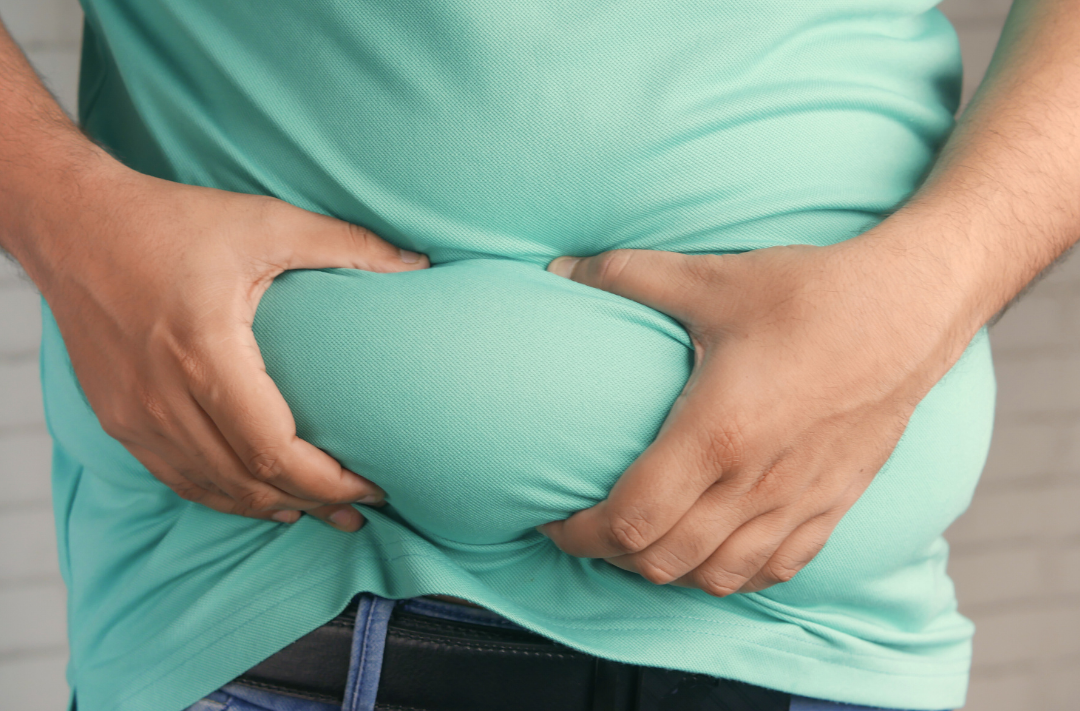 One of the biggest red flags is abdominal obesity where fat gathers around the waist and midsection. Photo: Canva 