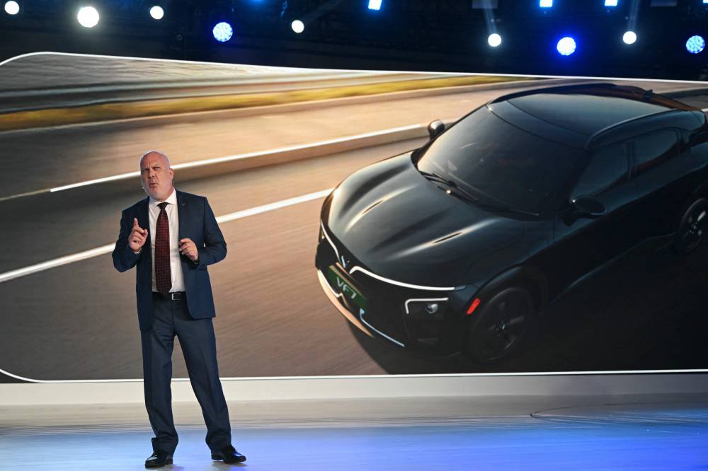 VinFast Asia's chief engineer Vince Pendlebury interacts during Vietnam’s VinFast premium electric SUVs launch in India, in New Delhi on September 6, 2025. (Photo by Arun SANKAR / AFP)