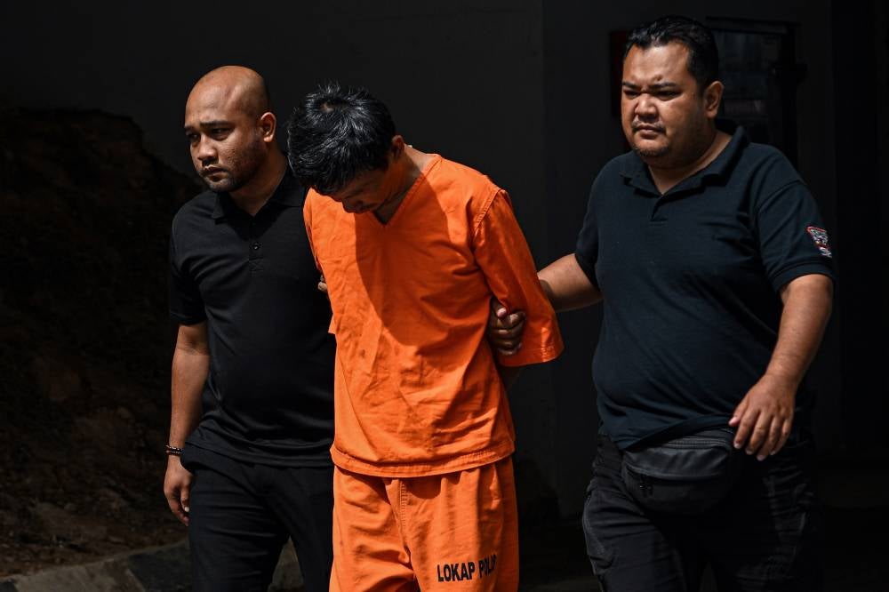 A 46-year-old father pleaded not guilty at the Sessions Court here today to a charge of causing the death of his two children at the estuary of Sungai Linggi, Tanjung Agas, Port Dickson, on Sept 4. Photo by Bernama
