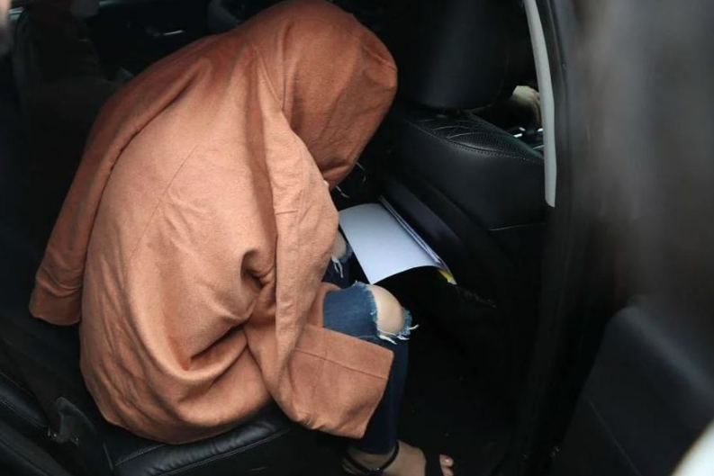 Hakyung Lee was extradited from Seoul in 2022 after the remains of her children, both aged under 10, were discovered in suitcases that had been left at a storage unit in south Auckland. - Photo by AFP