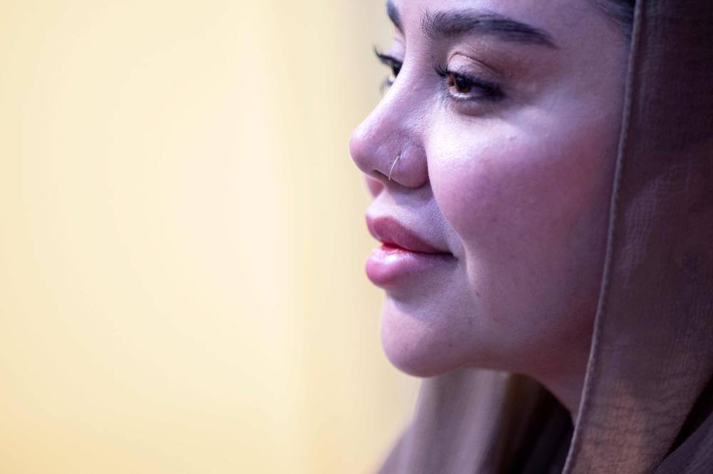 In this photograph taken on August 12, 2025, Lucky Khaan, co-director of Negin Asia Hospital, speaks during an interview with AFP in Kabul. Decked with fake crystal chandeliers and velvet sofas, cosmetic surgery clinics in Afghanistan's capital are a world away from the austerity of Taliban rule, where Botox, lip filler and hair transplants reign. (Photo by Wakil KOHSAR/AFP)