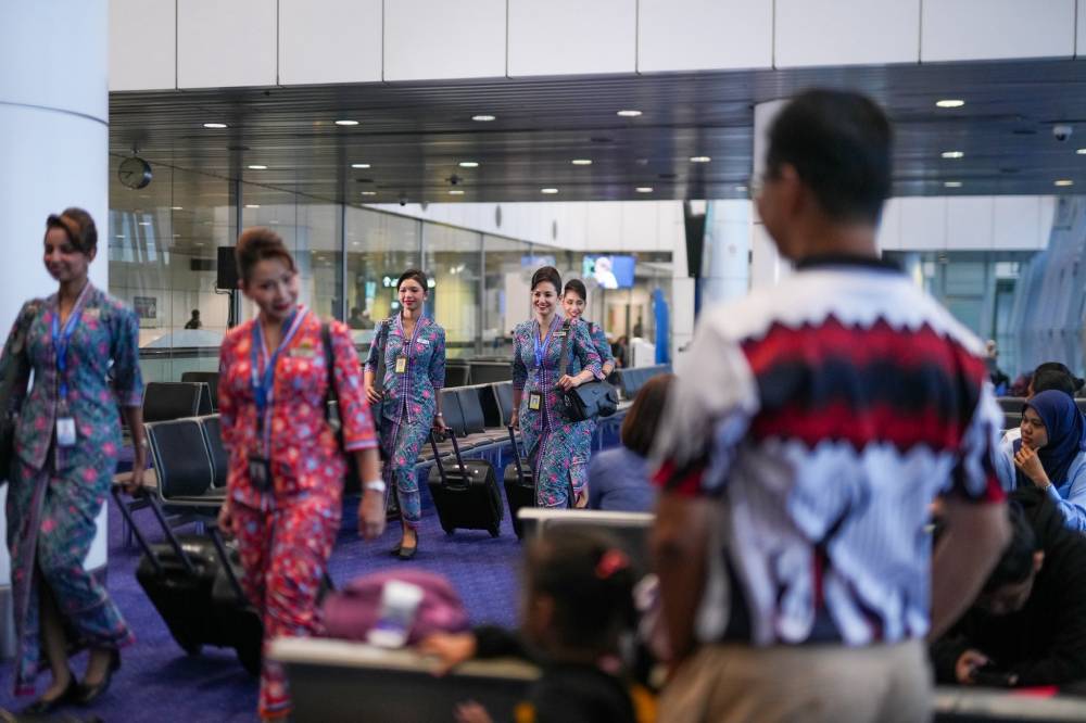 Malaysia Airlines made history when Flight MH2610 from Kuala Lumpur to Kota Kinabalu took off with an all-women team, from ground operations to the cockpit. - Photo: FACEBOOK / MALAYSIA AIRLINES