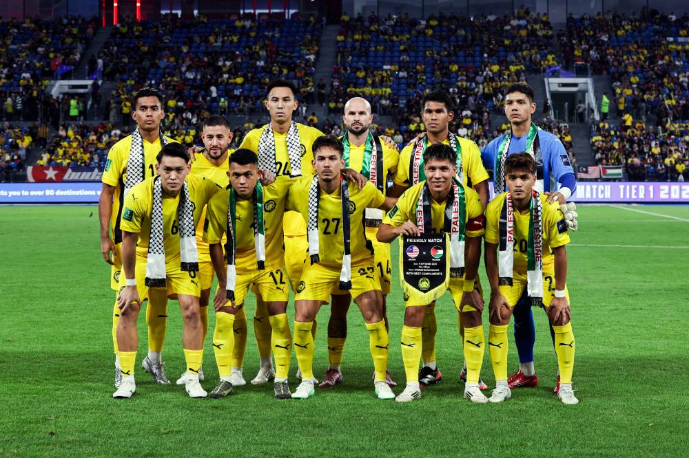 Harimau Malaya starting eleven pose for a photo ahead of the Tier 1 International Friendly match against Palestine at the Sultan Ibrahim Stadium on Sept 8. Bernama FILE PIX