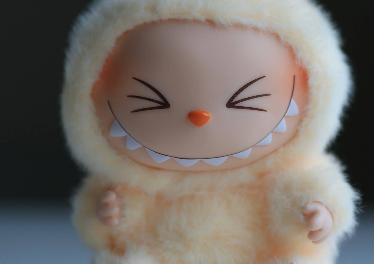 A Pop Mart Labubu collectible doll is seen on Sept 9, 2025, in Miami, Florida. Pop Mart, the Chinese toy company, has been struggling to stock stores with the Labubu, as the Labubu and "The Monsters" line is in high demand among consumers. (Photo illustration by Joe Raedle/Getty Images) (Photo by JOE RAEDLE / GETTY IMAGES NORTH AMERICA / Getty Images via AFP)