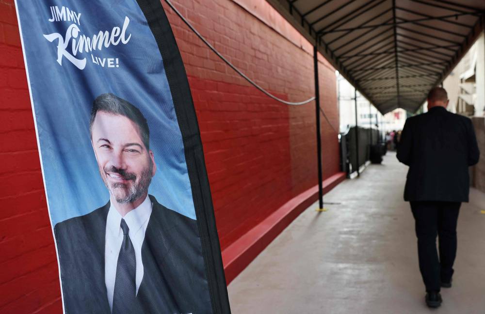A sign is displayed outside the El Capitan Entertainment Centre in Hollywood where the "Jimmy Kimmel Live!" show will be recorded on the first night the show will return to the ABC lineup on Sept 23, 2025 in Los Angeles, California. Kimmel's ABC late-night show is returning tonight after being suspended following controversy over his comments about the killing of Charlie Kirk. -(Photo by MARIO TAMA / Getty Images via AFP)