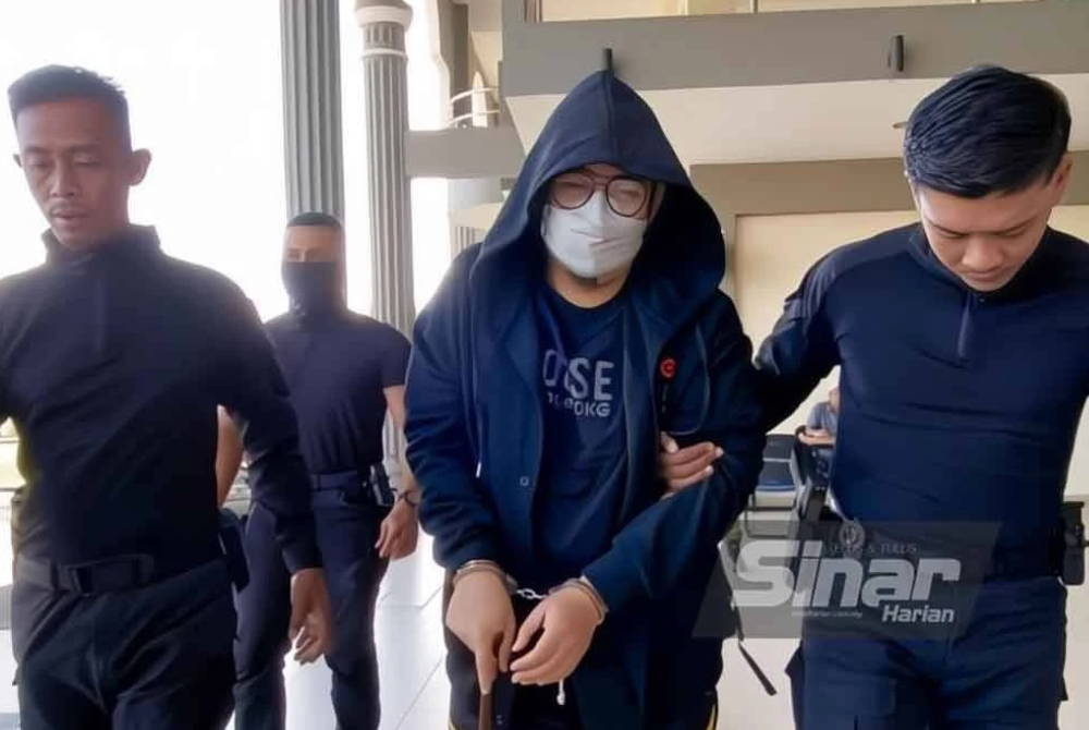 Previously, on Sept 11, the accused was charged in the Pasir Mas Sessions Court with seven counts of physical sexual assault on a male student and possession of obscene images and was granted bail of RM45,000. - Photo by SINAR/HAZELEN LIANA KAMARUDIN
