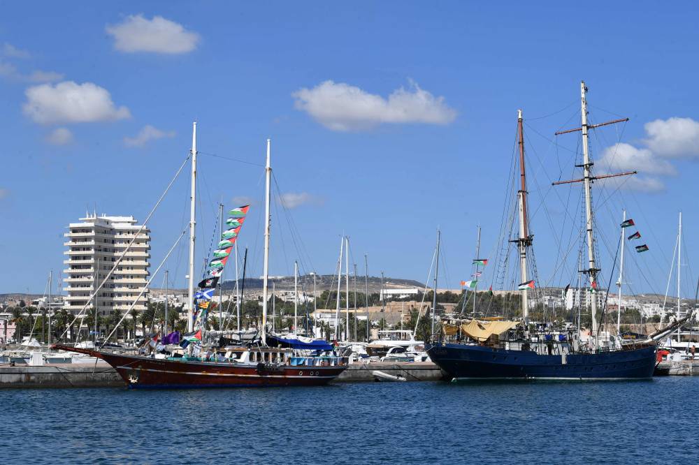 Boats, part of the Global Sumud Flotilla gather at the Tunisian port of Bizerte, ahead of the scheduled departure to the Gaza Strip to break Israel's blockade on the Palestinian territory on Sept 13, 2025. - (Photo by FETHI BELAID / AFP)