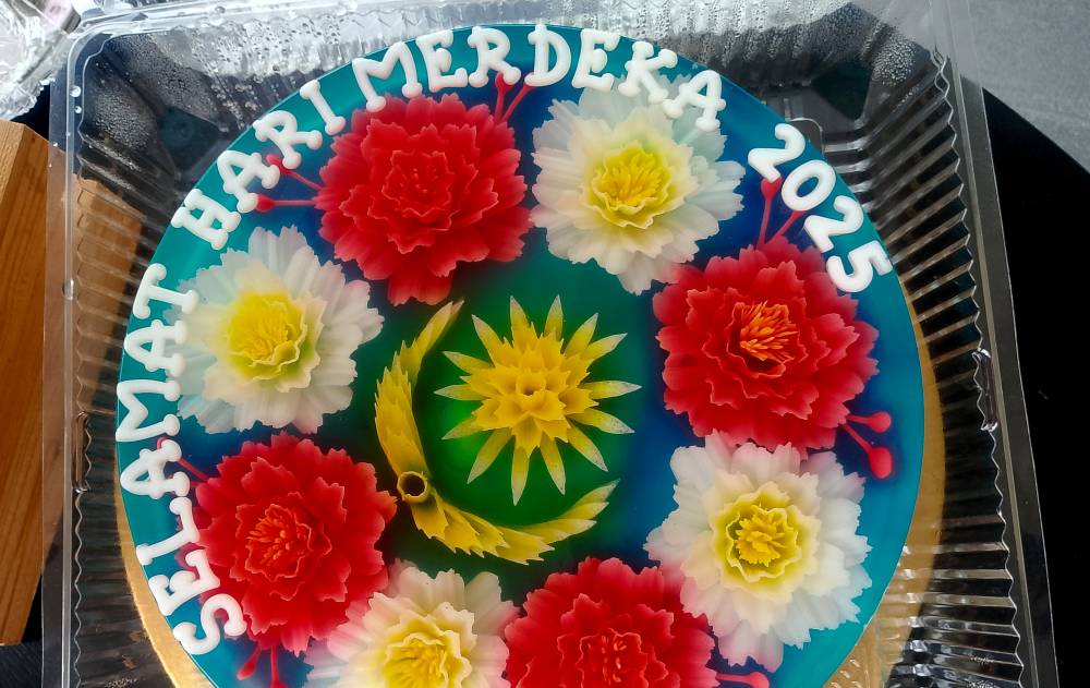 Displaying her patriotic spirit, the mother of two creates Jalur Gemilang-themed 3D jellies every August and September to mark National Day and Malaysia Day. - Bernama photo