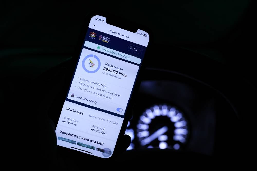 A petrol station’s app shows the remaining litres after refueling with subsidised Ron95 petrol at RM1.99 per litre today. Photo by Bernama