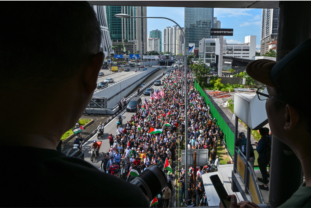 An investigation paper had been opened under Section 186 of the Penal Code for obstructing the police in carrying out their duties. - Bernama photo