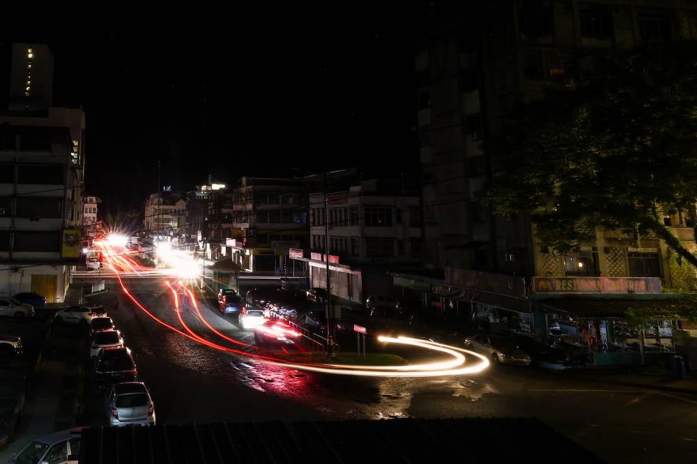The heart of Sandakan town centre is plunged into darkness due to a power outage that affected the entire Sabah east coast since 5.05pm on Sept 13, 2025, following a disruption in the 275KV Kolopis-Segaliud transmission line.