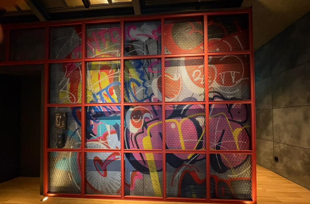 Local artist Jeff brings the streets of Kuala Lumpur indoors.