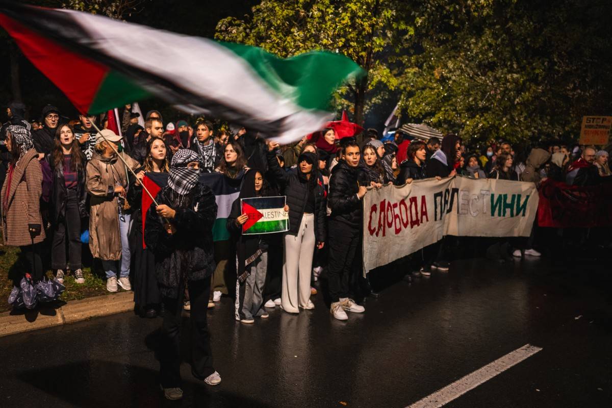 Demonstrators hold a banner reading "Freedom for Palestine" during a rally in solidarity with Palestinians and to protest the interception of the Global Sumud Flotilla by the Israeli navy, in front of the Israeli embassy in Belgrade on Oct 5. - Photo by Andrej ISAKOVIC / AFP