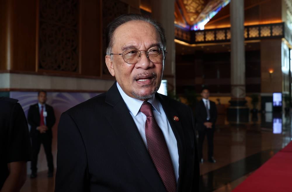 Prime Minister Datuk Seri Anwar Ibrahim at the Bunga Raya Complex, today. - Photo by Bernama