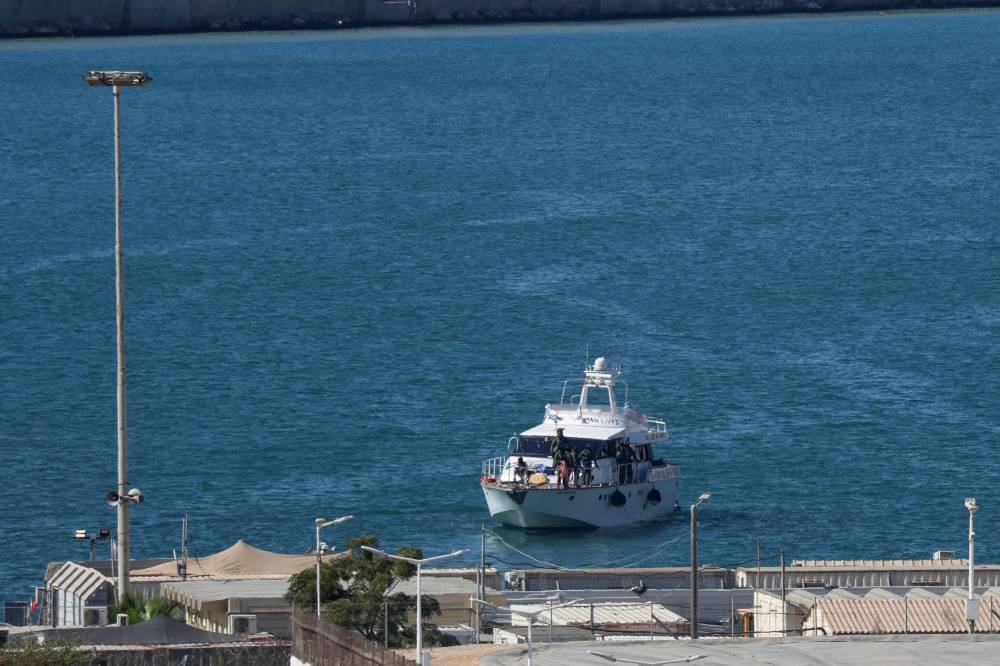 A boat from the Global Sumud Flotilla intercepted by Israeli forces in the Mediterranean sea off the Gaza Strip waters, is escorted into the southern port of Ashdod on Oct 2, 2025. - (Photo by Saeed Qaq / AFP)