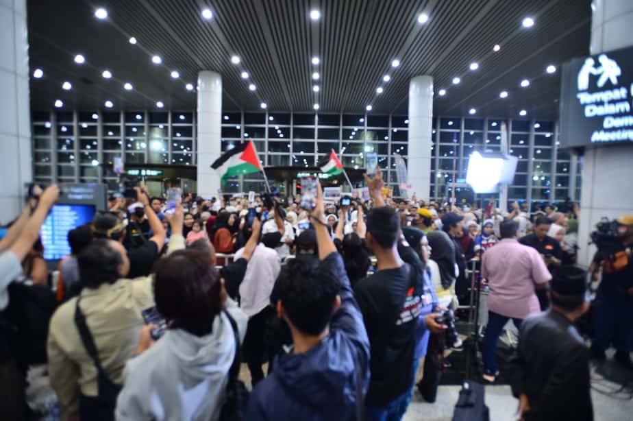 Supporters and family members await the arrival of Malaysian activists in the Global Sumud Flotilla (GSF) mission. - Photo by ASRIL ASWANDI SHUKOR