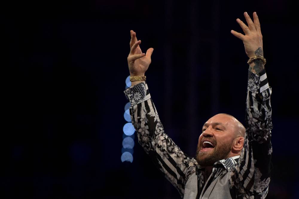 Irish mixed martial artist Conor McGregor reacts during the Bare Knuckle Fighting Championship (BKFC) in Marbella on October 12, 2024. Mixed martial arts star Conor McGregor has been issued an 18-month suspension after missing three drug tests in a 12-month period, anti-doping authorities said October 7, 2025. (Photo by JORGE GUERRERO / AFP)