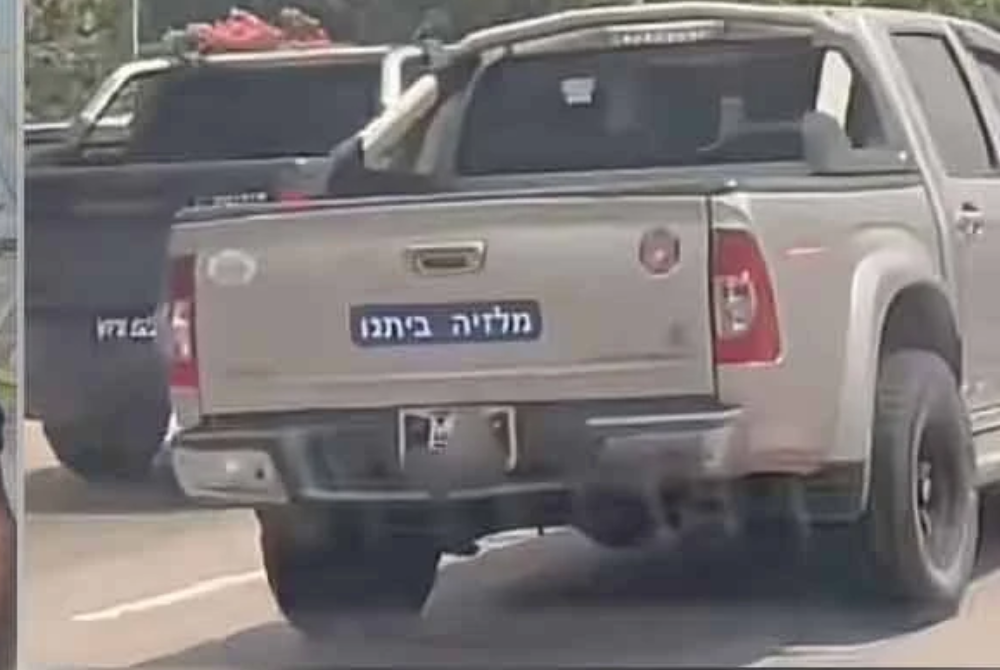 The video, which sparked widespread concern and anger, shows the controversial sticker on the back of an Isuzu 4WD.